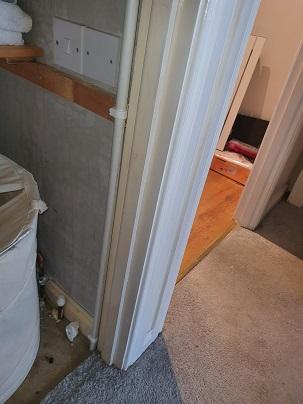 The cable comes under floor from stairs on right to airing room. 
